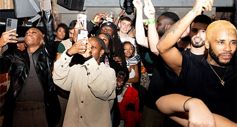 a group of people at The Silhouette Project's live concert 